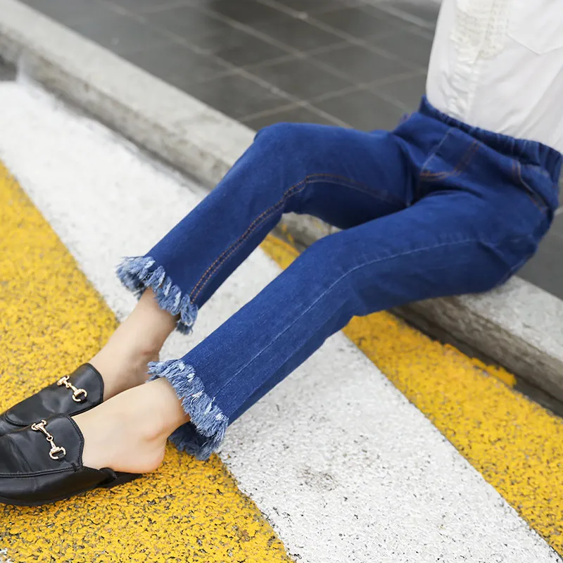 Flared Jeans with Frayed Ends