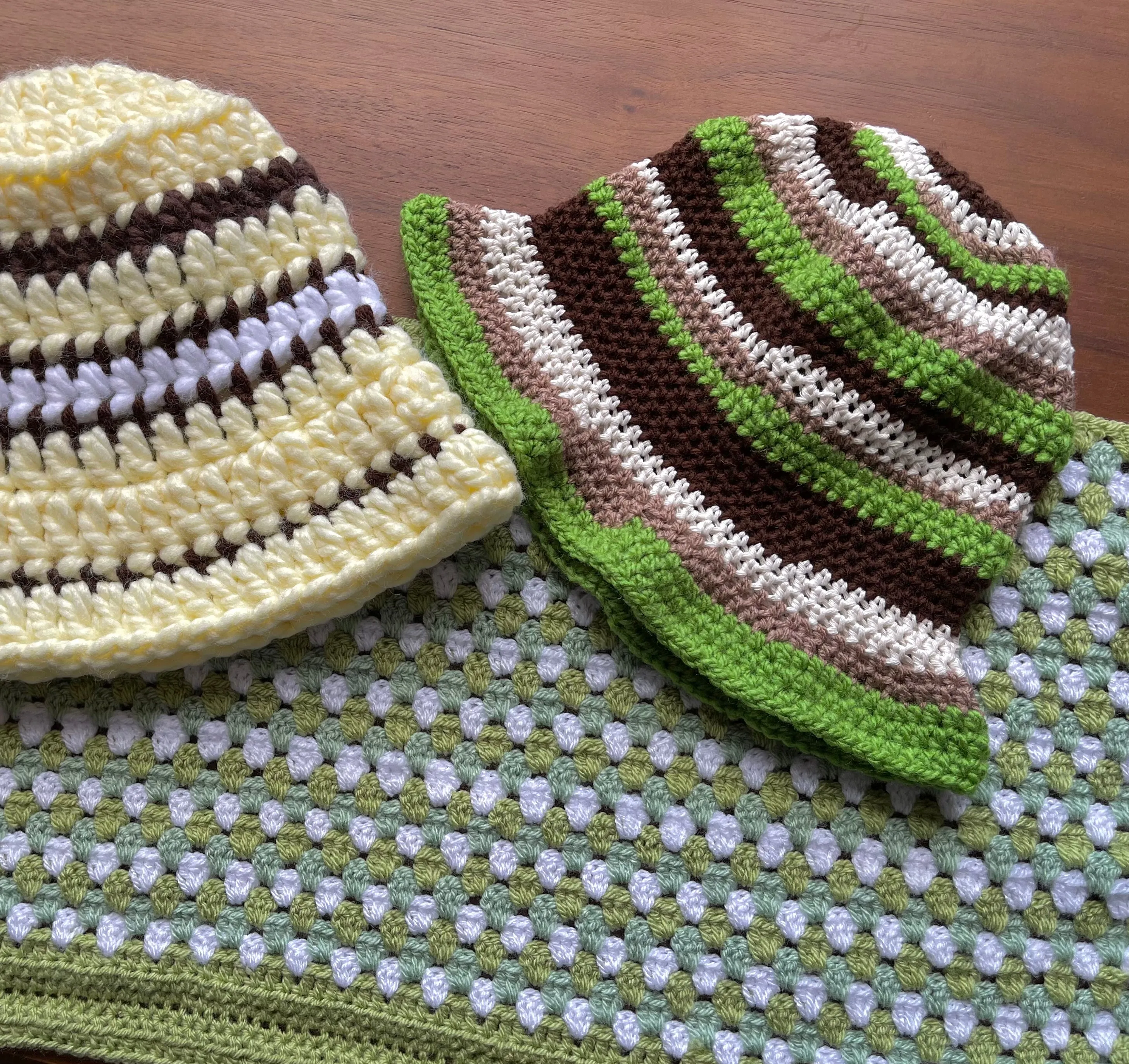 Handmade striped crochet bucket hat in green, brown and off white