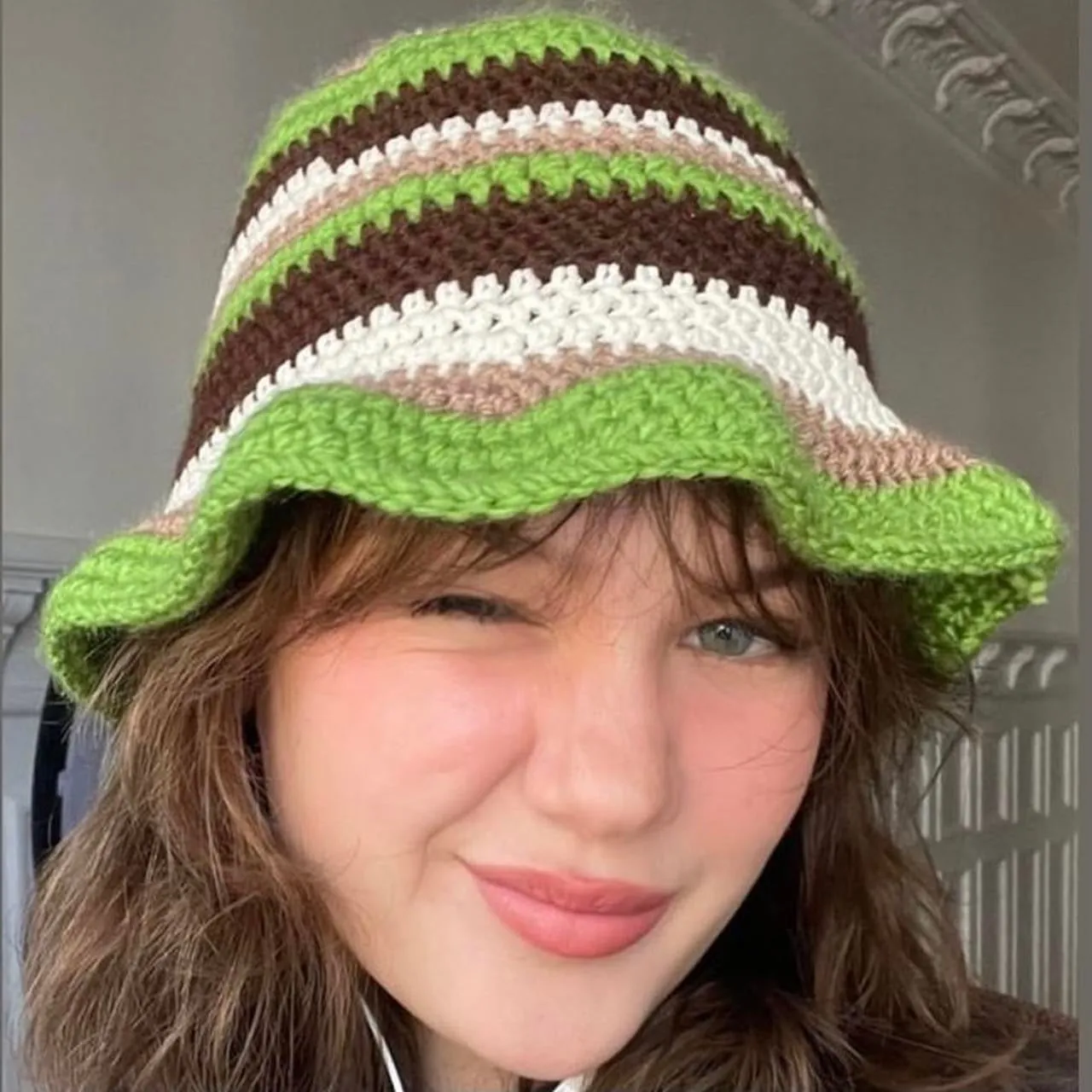 Handmade striped crochet bucket hat in green, brown and off white